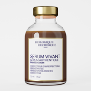 Biologique Recherche Serum Vivant skincare bottle with a gold cap and white label on a light gray background.