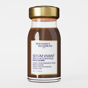 Biologique Recherche Serum Vivant skincare bottle with a gold cap and white label on a light gray background.